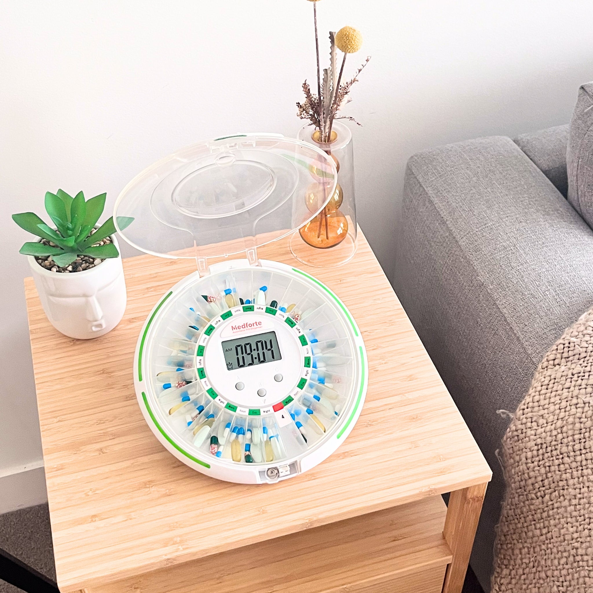 Medforte Automatic Pill Dispenser Sitting on Table Medforte Automatic Pill Dispenser Sitting on Table